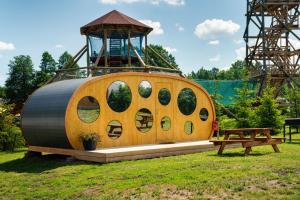 a dome shaped building with a gazebo in a park at Vudila Peremajad in Kaiavere