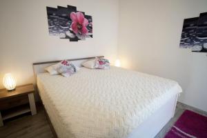 Ένα ή περισσότερα κρεβάτια σε δωμάτιο στο Appartment Nicole