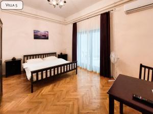 Posteľ alebo postele v izbe v ubytovaní Gosztonyi Villa