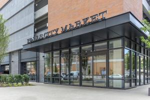 a building with a sign on the front of it at Omni Louisville Hotel in Louisville
