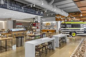 a food store with tables and a truck in the background at Omni Louisville Hotel in Louisville