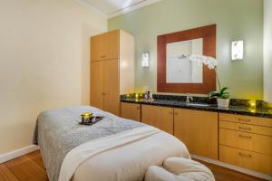 Voodi või voodid majutusasutuse Mokara Hotel & Spa toas