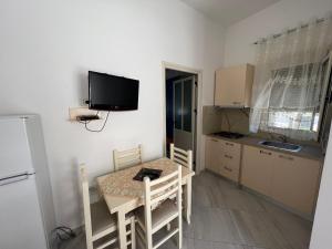 Kuchyň nebo kuchyňský kout v ubytování Guest House Vlore