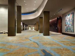 a large room with a large painting on the wall at Omni Dallas Hotel in Dallas