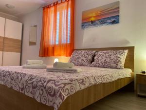 Un pat sau paturi într-o cameră la Guesthouse Casa Barbaro