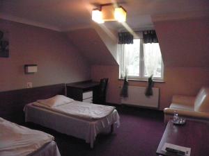 Postel nebo postele na pokoji v ubytování Motel Tower