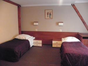 Postel nebo postele na pokoji v ubytování Motel Tower