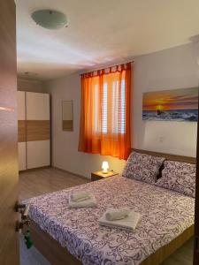 Postel nebo postele na pokoji v ubytování Guesthouse Casa Barbaro + 36 fotografií