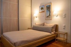 Posteľ alebo postele v izbe v ubytovaní G&N APARTMENT