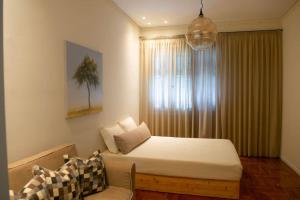 Posteľ alebo postele v izbe v ubytovaní G&N APARTMENT