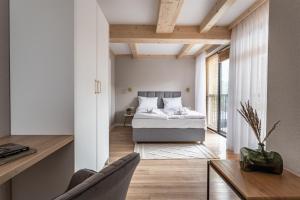 Posteľ alebo postele v izbe v ubytovaní ZAKOHOME- Apartamenty Sabały