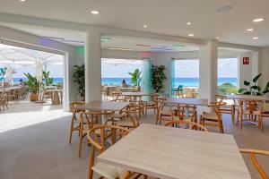 Reštaurácia alebo iné gastronomické zariadenie v ubytovaní Hotel Maysi