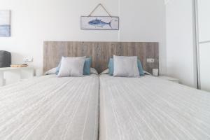 Posteľ alebo postele v izbe v ubytovaní Moderno Estudio con terraza en Las Canteras