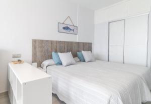 Posteľ alebo postele v izbe v ubytovaní Moderno Estudio con terraza en Las Canteras