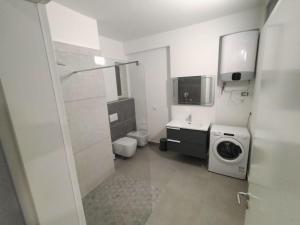 Koupelna v ubytování Junik Apartment + 13 fotografií