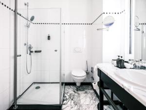 Koupelna v ubytování Falkensteiner Spa Resort Marianske Lazne