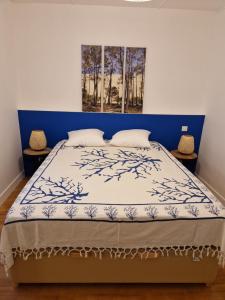 Łóżko lub łóżka w pokoju w obiekcie Villa Bagatelle à 300m de la plage centrale, 3 chambres