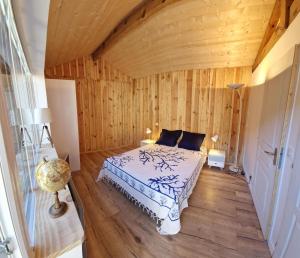 Łóżko lub łóżka w pokoju w obiekcie Villa Bagatelle à 300m de la plage centrale, 3 chambres