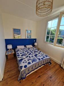 Łóżko lub łóżka w pokoju w obiekcie Villa Bagatelle à 300m de la plage centrale, 3 chambres
