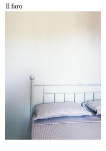 Postel nebo postele na pokoji v ubytování VIGNA VECCHIA