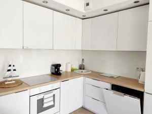Kuchyňa alebo kuchynka v ubytovaní Apartament blisko plaży + 3 fotografie