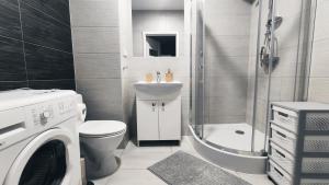 Kúpeľňa v ubytovaní Dąbska 18D by Homeprime