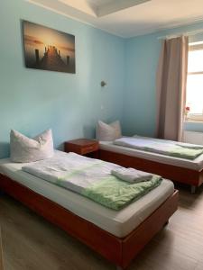 Postel nebo postele na pokoji v ubytování Hotel Plovdiv
