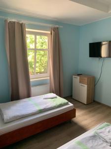 Postel nebo postele na pokoji v ubytování Hotel Plovdiv + 7 fotografií