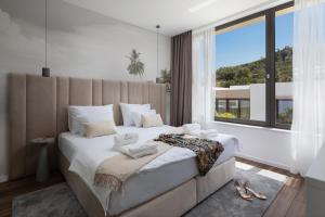 Postel nebo postele na pokoji v ubytování The Palms resort