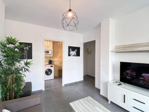 TV a/nebo společenská místnost v ubytování Nevada Centro Casasol