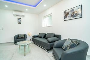 Ruang duduk di Hidden Gem Apartment