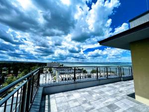 A balcony or terrace at ELLBy Apartman - PENTHOUSE - hostAID