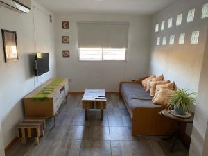 TV a/nebo společenská místnost v ubytování Casa Limon, en complejo residencial con Cochera