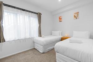 Letto o letti in una camera di Spa, Mountains & Lake