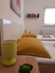 Postel nebo postele na pokoji v ubytování InOsijek- FEELS LIKE HOME