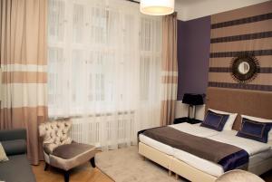Postel nebo postele na pokoji v ubytování Hotel Elba am Kurfürstendamm - Design Chambers