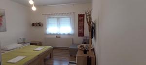 Postel nebo postele na pokoji v ubytování InOsijek- FEELS LIKE HOME