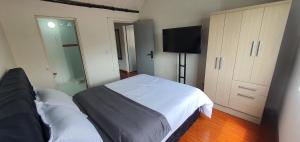 Postel nebo postele na pokoji v ubytování Portal Norte 170 ACOGEDORAS HABITACIONES CON TODOS LOS SERVICIOS