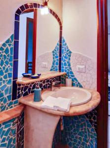 Ванна кімната в Cuccuru Relax - B IUN Q9882