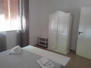 Кровать или кровати в номере VILLA SALINA MONACI