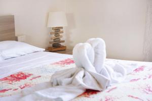 Posteľ alebo postele v izbe v ubytovaní Acciuga House