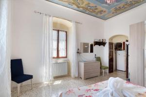 Posteľ alebo postele v izbe v ubytovaní Acciuga House
