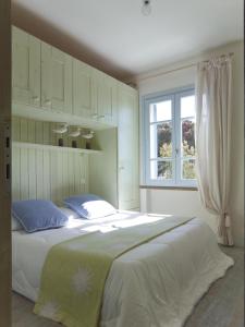 Ένα ή περισσότερα κρεβάτια σε δωμάτιο στο Villa Mazzanta Relais & Residence