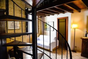 Postel nebo postele na pokoji v ubytování B&B Demetra Appartamenti