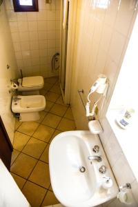 Koupelna v ubytování B&B Demetra Appartamenti