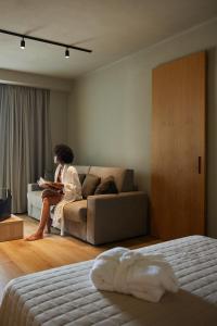 A seating area at Mima Aparthotel Boutique & Spa