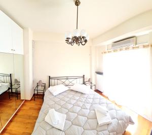 Posteľ alebo postele v izbe v ubytovaní Downtown, penthouse apartment with great view, Pagkrati