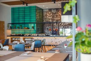 Restaurace v ubytování Q Hotel Plus Wrocław Bielany
