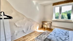 Posteľ alebo postele v izbe v ubytovaní Bieszczady Guest House