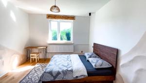 Posteľ alebo postele v izbe v ubytovaní Bieszczady Guest House